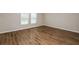 Bright bedroom with wood floors and natural light at 4035 Gardenia Ave, Lake Hamilton, FL 33851