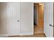 This hall features tile flooring and white doors at 6255 Christina Ct, Orlando, FL 32810