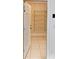 Walk-in pantry with multiple shelves for storage and tile floor at 6255 Christina Ct, Orlando, FL 32810