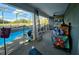 Lounge by the sparkling pool surrounded by a screened enclosure providing comfort at 205 Golf Aire Blvd, Haines City, FL 33844
