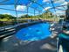 Aerial view of a private pool, complete with landscaping for the ultimate outdoor retreat at 205 Golf Aire Blvd, Haines City, FL 33844
