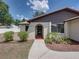 Charming single-story home with well-maintained landscaping and an inviting entryway at 2271 Crystal Grove Ln, Lakeland, FL 33801