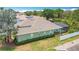 Aerial shot of the house, backyard and enclosed pool at 2806 Spinning Silk Ct, Kissimmee, FL 34747
