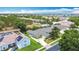 Aerial view featuring the house, driveway and surrounding green space at 2806 Spinning Silk Ct, Kissimmee, FL 34747