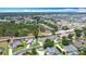 An aerial shot featuring residential homes and lush green landscaping in a suburban setting at 2806 Spinning Silk Ct, Kissimmee, FL 34747