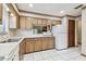 A classic kitchen featuring ample cabinet space, white appliances, and a bright, clean aesthetic at 519 Market W Sq, Lakeland, FL 33813