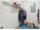 This walk-in closet is equipped with shelving for storage, as well as space for hanging clothing at 519 Market W Sq, Lakeland, FL 33813