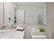 Clean bathroom with marble countertop, modern sink, and decorative storage for essentials at 811 Patricia Pl, Lakeland, FL 33809