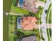 Overhead angle of waterfront property showing backyard, screened-in patio, dock and access to the lake at 1140 Terralago Way, Kissimmee, FL 34746