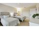Clean bedroom featuring two twin beds and neutral color palette at 1140 Terralago Way, Kissimmee, FL 34746