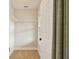 Empty walk-in closet with white wire shelving and carpeted floor at 1140 Terralago Way, Kissimmee, FL 34746