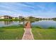 Waterfront property with a private dock, perfect for boating and enjoying the water views at 1140 Terralago Way, Kissimmee, FL 34746