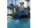 Resort-style community pool with a fun waterslide and plenty of space for recreation at 1140 Terralago Way, Kissimmee, FL 34746