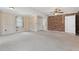 Bedroom with neutral walls, ceiling fan, and tile flooring at 1212 Blake Ave, Auburndale, FL 33823