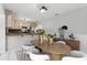 Stylishly furnished dining area adjacent to a functional kitchen space at 1212 Blake Ave, Auburndale, FL 33823