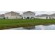 View of the backyard, highlighting the sliding glass doors and ample space at 1424 Axel Cir, Winter Haven, FL 33880