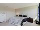 Bedroom features light walls, carpet flooring, and well-lit window at 1424 Axel Cir, Winter Haven, FL 33880