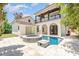 Backyard featuring a pool, raised spa, and second story balcony with wood features at 952 Moss Ln, Winter Park, FL 32789