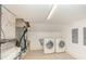 A clean laundry room features a washer, dryer, and utility equipment at 952 Moss Ln, Winter Park, FL 32789