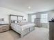 Inviting main bedroom with natural light, neutral tones, and tasteful decor at 1508 Majestic Ln, Winter Haven, FL 33880