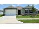 Charming single-Gathering home with a well-manicured lawn and a two-car garage at 3148 Caspian Feather St, Bartow, FL 33830