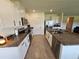 Well-equipped kitchen with stainless steel appliances, granite countertops, and ample cabinet space at 3148 Caspian Feather St, Bartow, FL 33830