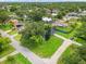 An aerial view of the home showcases the property's lush lawn and mature landscaping in a quiet neighborhood at 3331 Lime Tree Dr, Edgewater, FL 32141