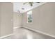 Modest bedroom with tile floors, window, and ceiling fan at 3331 Lime Tree Dr, Edgewater, FL 32141