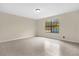 Cozy bedroom with tile flooring, natural lighting through large window at 3331 Lime Tree Dr, Edgewater, FL 32141