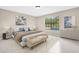 Staged bedroom showcasing natural light, tile floors, and modern decor at 3331 Lime Tree Dr, Edgewater, FL 32141