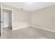 Spacious bedroom featuring tiled floors, large closet and neutral colored walls at 3331 Lime Tree Dr, Edgewater, FL 32141