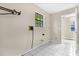 The laundry room has tile floors, a window, and washer/dryer hookups at 3331 Lime Tree Dr, Edgewater, FL 32141