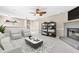 Comfortable living room with a fireplace, tile flooring, modern furnishings, and a stylish area rug at 3331 Lime Tree Dr, Edgewater, FL 32141