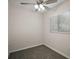 Bedroom featuring neutral colored walls, ceiling fan, and carpeted floors at 9755 Se 176Th St, Summerfield, FL 34491