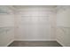 Walk-in closet with shelving and carpet flooring at 9755 Se 176Th St, Summerfield, FL 34491