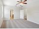 Spacious bedroom with neutral carpet, multiple closets, and ensuite bathroom access at 3848 Spirited Cir, St Cloud, FL 34772