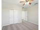 Comfortable bedroom with plush carpet, ample closet space, and neutral walls at 3848 Spirited Cir, St Cloud, FL 34772
