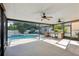 Screened-in pool patio with outdoor kitchen area, perfect for entertaining and enjoying the outdoors at 3848 Spirited Cir, St Cloud, FL 34772