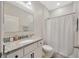 Bathroom featuring granite countertops, and modern vanity with white cabinets at 1803 Daybreak Dr, Fruitland Park, FL 34731