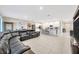Spacious open floor plan with a modern kitchen and a comfortable living area at 1803 Daybreak Dr, Fruitland Park, FL 34731
