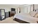 Bright main bedroom featuring light colored walls, a ceiling fan, and neutral-toned carpet at 1803 Daybreak Dr, Fruitland Park, FL 34731