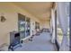 Relaxing screened porch with seating, perfect for enjoying the outdoors at 1803 Daybreak Dr, Fruitland Park, FL 34731