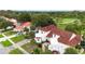 Aerial view of a home with lush landscaping and a well-maintained exterior in a verdant neighborhood at 2524 Albion Ave, Orlando, FL 32833