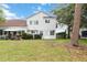 The backyard is well-maintained with a screened-in porch and open grass area at 2524 Albion Ave, Orlando, FL 32833