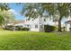 The backyard has a well-maintained lawn with a patio at 2524 Albion Ave, Orlando, FL 32833