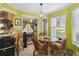 Cozy breakfast nook featuring a glass-top table and wicker chairs, perfect for casual dining at 2524 Albion Ave, Orlando, FL 32833