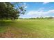 The property includes a large, open grass area at 2524 Albion Ave, Orlando, FL 32833