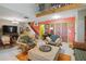 Living room featuring high ceilings, a second floor balcony and colorful walls at 2524 Albion Ave, Orlando, FL 32833