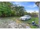 Large backyard with lush greenery, offering ample space at 1224 S Delaware Ave, Deland, FL 32720