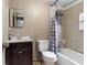 Standard bathroom featuring tiled shower and bath with updated vanity at 1224 S Delaware Ave, Deland, FL 32720